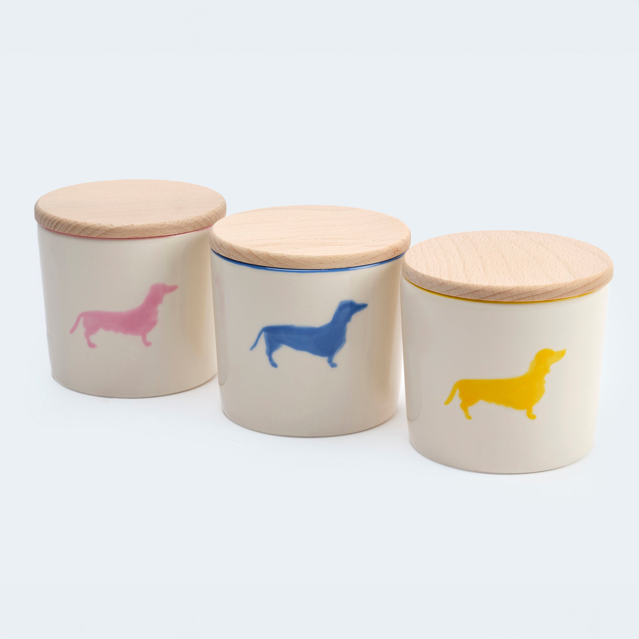 Leopolds Leckerlidosen in Gelb, Blau und Rosa